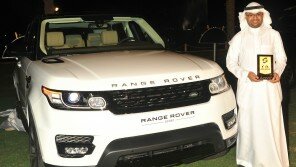 Amr Badghaish - JLR MYNM next to Range Rover Sport